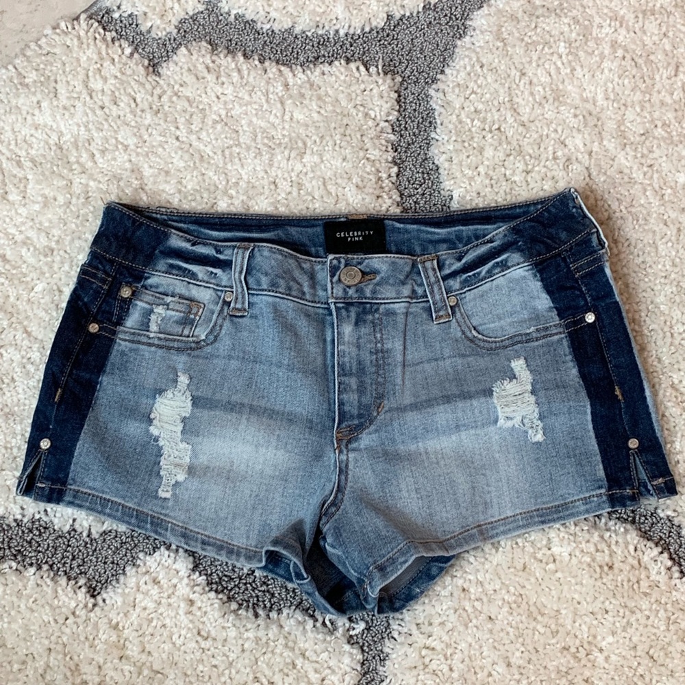 Celebrity Pink. Blue/dark blue shorts.